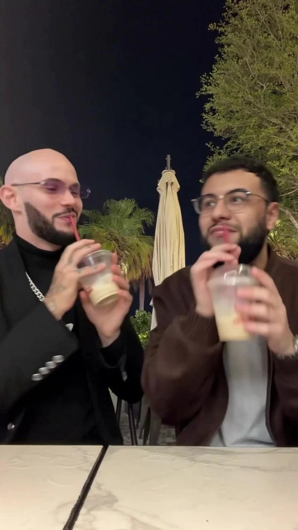 Fully replace both young men in @video1 with the people from the references: the man on the left is replaced with the person from @image1, the man on the right …